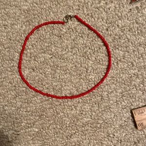 RED NECKLACE